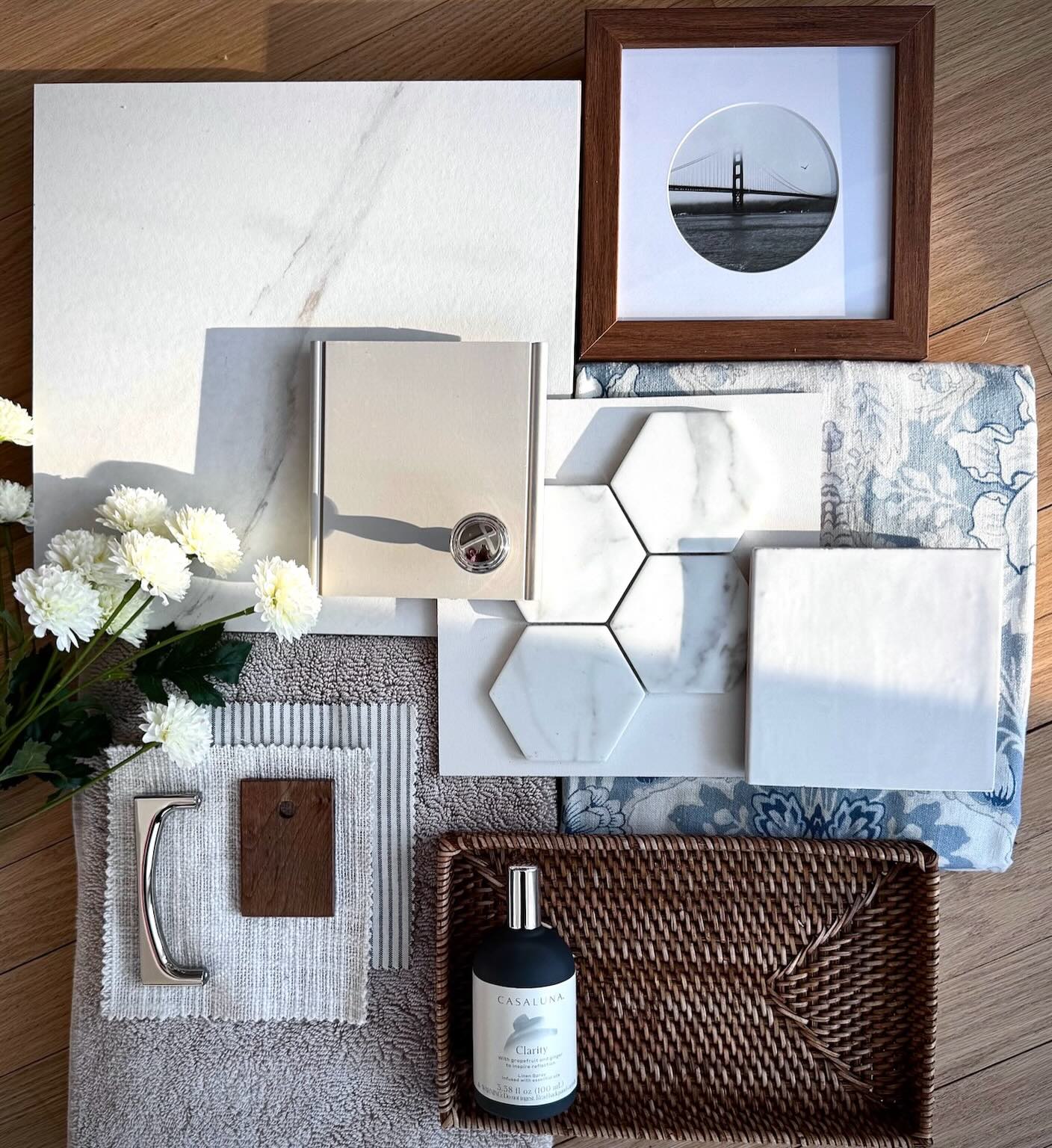 Currently working on a bathroom reno and the vision is clear: fresh, airy, and neutral with a soft pop of pattern and color to keep it interesting.

We’re striking a balance between serene spa and subtle heritage charm. Here’s a peek at the mood board and a few of our selections:

• Taupe shaker-style cabinetry for the double vanity
• Warm white walls
• Polished nickel hardware
• White 5x5” glossy zellige-inspired shower tile
• 3” Carrara hex mosaic for the shower floor
• 12x12” Carrara porcelain tile for the main bathroom floor
• A soft, heritage-inspired blue floral shower curtain to layer in a bit of pattern and color
• Warm wood and woven accents for depth and texture

Calm, layered, and timeless. Demo starts next month ✨